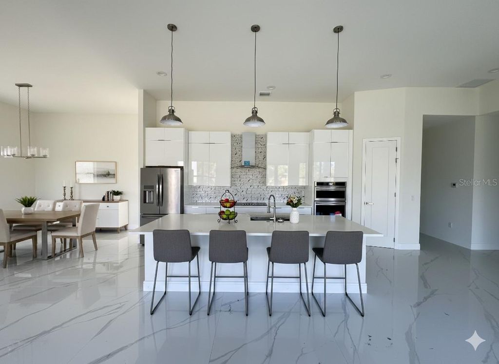 Photo of 2514 Music Lane, North Port, FL 34286 (MLS # O6363210)