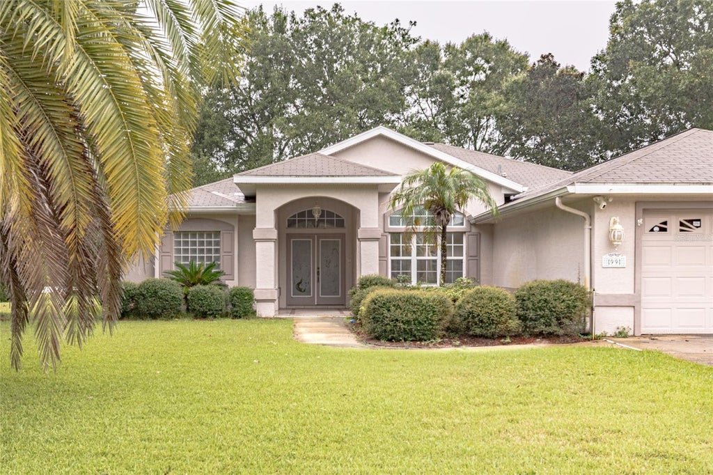 Photo of 99 Eric Drive, Palm Coast, FL 32164 (MLS # FC321941)