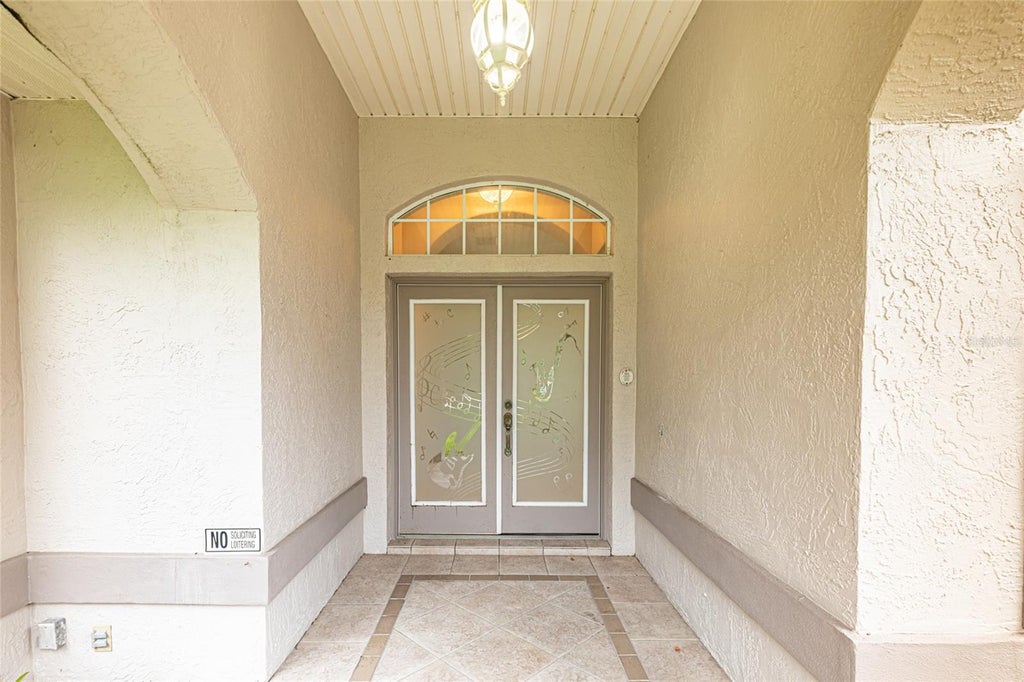 Photo of 99 Eric Drive, Palm Coast, FL 32164 (MLS # FC321941)