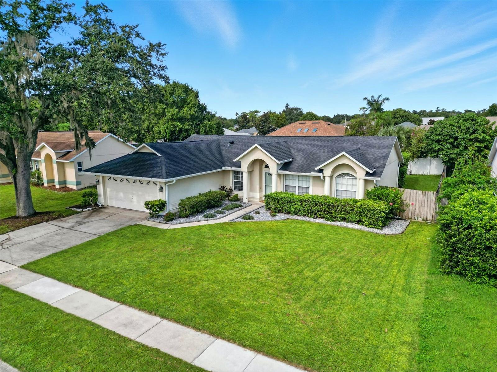 Nestled in the highly desirable Chickasaw Trails community, this beautifully maintained 4-bedroom, 2-bath home perfectly blends comfort, style, and functionality. From the moment you arrive, the well-manicured landscaping, extended driveway, and inviting entryway create a warm and welcoming first impression.
Step inside to discover an open, light-filled layout with high ceilings and plenty of natural light, creating a spacious and airy feel throughout. The formal living and dining areas flow seamlessly into a thoughtfully updated kitchen, featuring stainless steel appliances, granite countertops, ample cabinetry, and a breakfast bar—ideal for both everyday living and effortless entertaining.
The split-bedroom floor plan offers maximum privacy, with a generously sized primary suite boasting a walk-in closet and a beautifully updated ensuite bathroom. Three additional bedrooms provide flexible space for family, guests, or a home office.
This home also features valuable updates and amenities, including a new roof (2019), a new AC unit (2020), a spacious 2-car garage, and a low HOA. Conveniently located just minutes from SR 417, Waterford Lakes Town Center, UCF, Orlando International Airport, and Downtown Orlando, you'll enjoy easy access to shopping, dining, and top-rated schools.
Whether you're upsizing, relocating, or searching for a move-in-ready home in a well-established neighborhood, this home has it all. Don’t miss this opportunity!