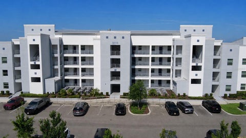 Photo of 3111 Paradox Circle #108, Kissimmee, FL 34746 (MLS # O6422807)