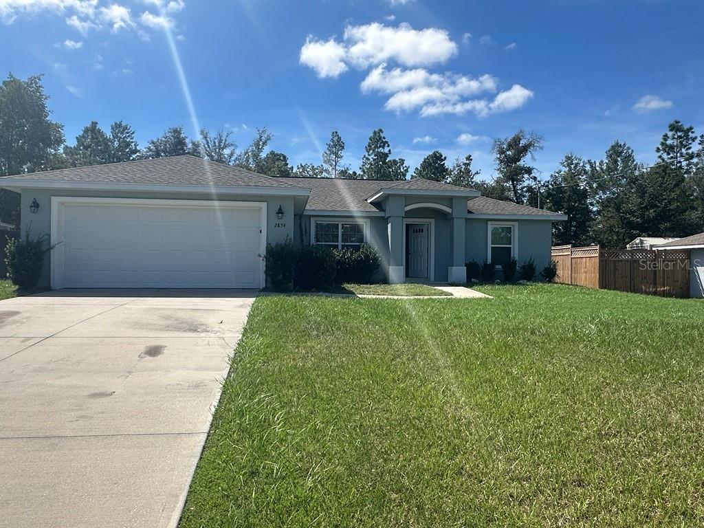 Photo of 2854 W Edison Place, Citrus Springs, FL 34433 (MLS # O6447237)