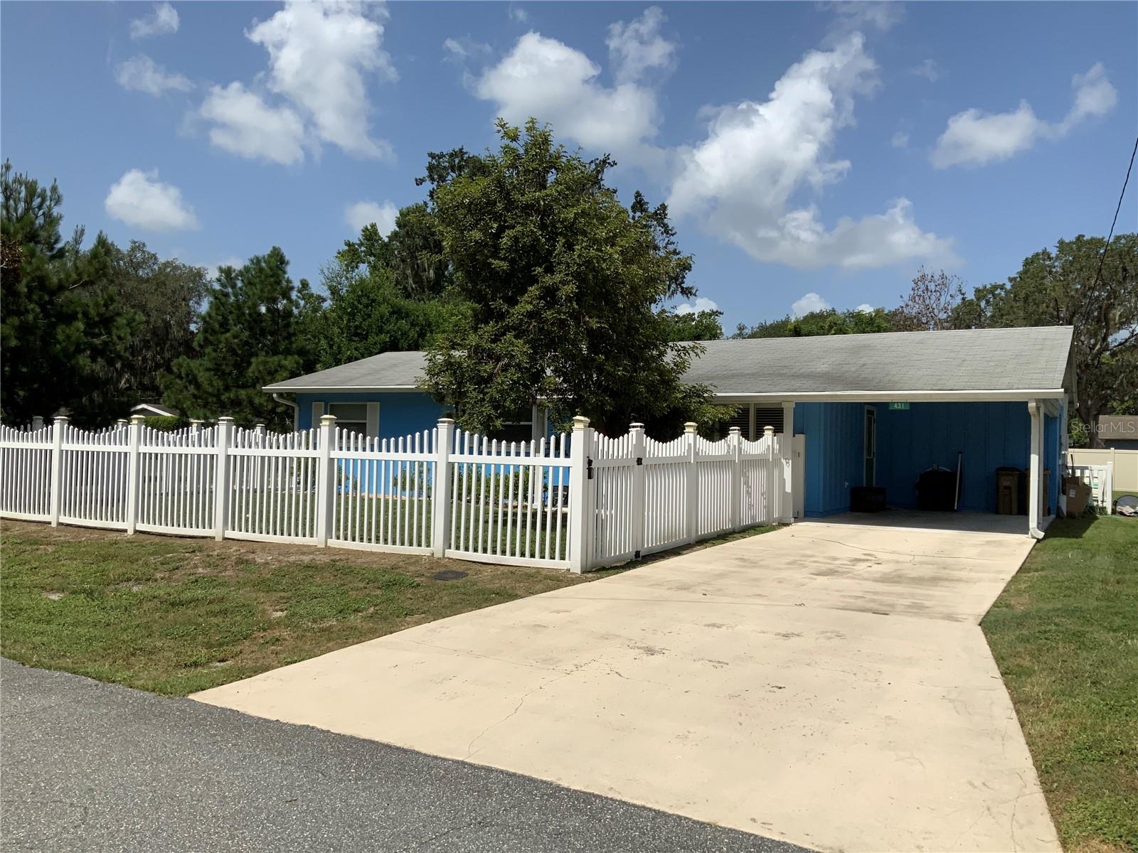 Location is key and this is it for sure!! This home is in need of some TLC and seller is aware of this fact. We have priced this home with the considerations as to what it will take to make it comparable to market value after the completed repairs. This home is very spacious with an open floor plan, beautiful kitchen remodeled and tons of potential. This home is just a block off of Lakeshore Drive in Mount Dora with access to the lake for fishing from their private fishing dock. Located in a nice country setting and yet so close to all the common amenities. Seller has said make an offer, she is ready to down size and move on to something that suits her needs.