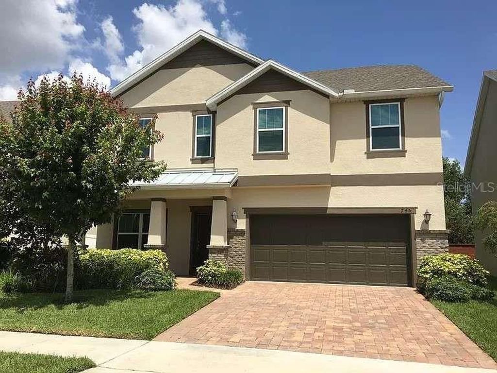 Photo of 745 Marsh Reed Drive, Winter Garden, FL 34787 (MLS # TB8514854)