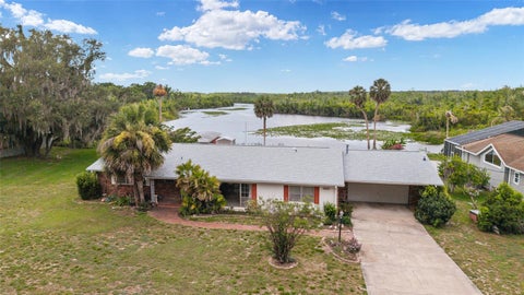 Photo of 35237 Mulholland Drive, Fruitland Park, FL 34731 (MLS # G5113977)