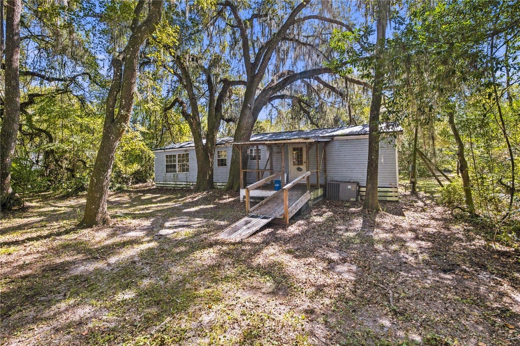 Photo of 5804 SW 144th Lane, Micanopy, FL 32667 (MLS # OM734578)