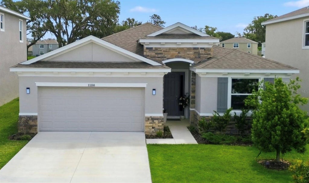 Photo of 11316 Spoonbill Flock Way, San Antonio, FL 33576 (MLS # TB8517214)