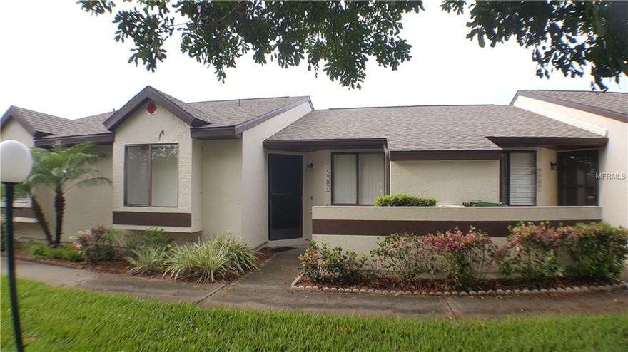 HAS BEEN LEASED JANUARY-APRIL, 2025. Welcome to your charming furnished villa, offering the perfect blend of comfort and convenience. Nestled in a prime location, this two-bedroom, two-bathroom abode boasts a cozy ambiance and modern amenities. As you step inside, you're greeted by the warmth of wood laminate flooring that extends gracefully throughout the space, complemented by vinyl floors in the kitchen and bathrooms. The master bedroom beckons with a luxurious queen bed and an ensuite featuring a convenient walk-in shower. Meanwhile, the guest bedroom offers cozy twin beds and a tub/shower combination for added versatility. Both bedrooms are equipped with newer mattresses, ensuring a restful night's sleep, while the tastefully appointed living and dining areas feature furniture that's less than three years old, providing a contemporary touch to the interior. Step outside to your private screened patio, where you can unwind amidst the tranquility of the surroundings. For added convenience, a washer and dryer are discreetly tucked away in a utility closet within the kitchen, making laundry day a breeze. Situated across the street from the YMCA, and just a stone's throw away from GT Bray Park and HCA Blake Hospital, this villa offers unparalleled access to recreational facilities and healthcare services, ensuring a lifestyle of convenience and well-being. Don't miss out on this opportunity to experience comfortable living in a prime location.