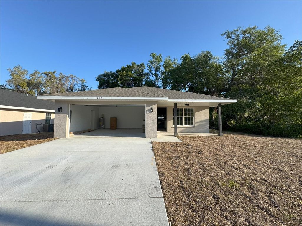 Photo of 1112 Eden Drive, Inverness, FL 34450 (MLS # OM721975)
