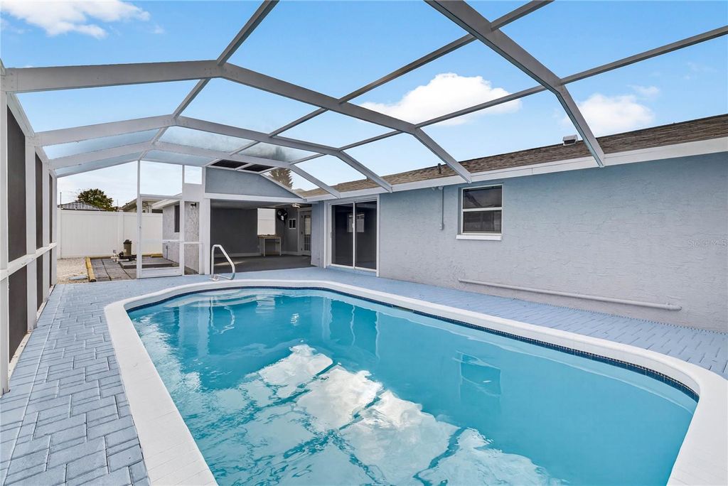 Photo of 11214 Kapok Avenue, Port Richey, FL 34668 (MLS # TB8460490)