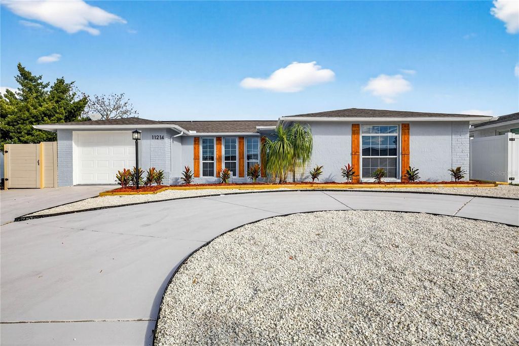 Photo of 11214 Kapok Avenue, Port Richey, FL 34668 (MLS # TB8460490)