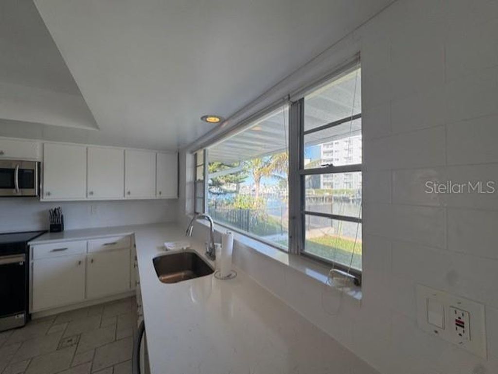 Photo of 216 Palm Island NW, Clearwater Beach, FL 33767 (MLS # TB8448247)