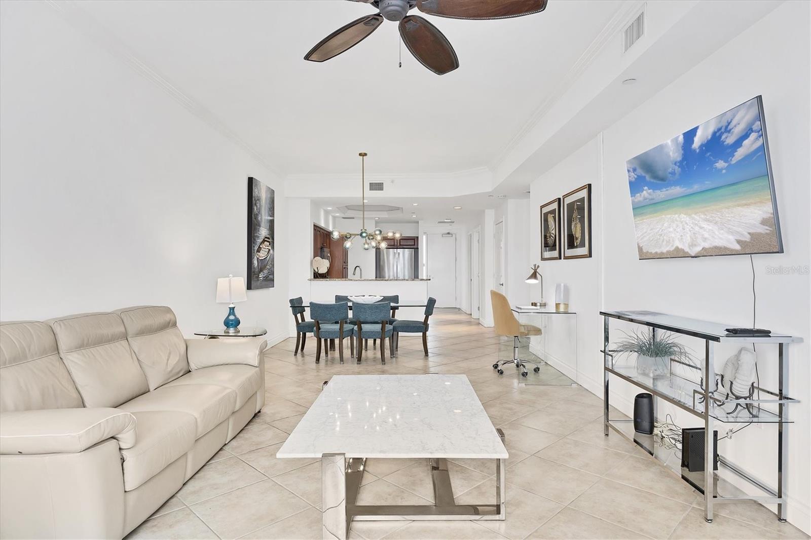 TURN KEY, ALL INCLUDED!
One Month Minimum! Enjoy an elegant experience in this centrally located place. From your unit’s windows, you can take in views of downtown Lakewood Ranch, fountains, a movie theater, mini-golf, shops, and restaurants.
This recently renovated condo is bright and spacious. The living room features brand-new Italian leather furniture—both the sofa and chair are reclining and incredibly comfortable. Additionally, there is a large granite coffee table and modern side tables. A 75-inch TV is mounted in the living area for your entertainment.
The modern glass dining table comfortably seats six, making it perfect for gatherings. The primary bedroom boasts a king-size bed, a large dresser, and a TV. The guest bedroom features a Scandinavian-style bedroom set with a queen-size bed and a TV as well.
The kitchen is fully equipped, so you can even prepare a Thanksgiving dinner with ease! For your convenience, the unit includes an in-unit laundry. An elevator provides easy access to the assigned parking space.
Immerse yourself in an elegant and convenient experience at this exceptional property!