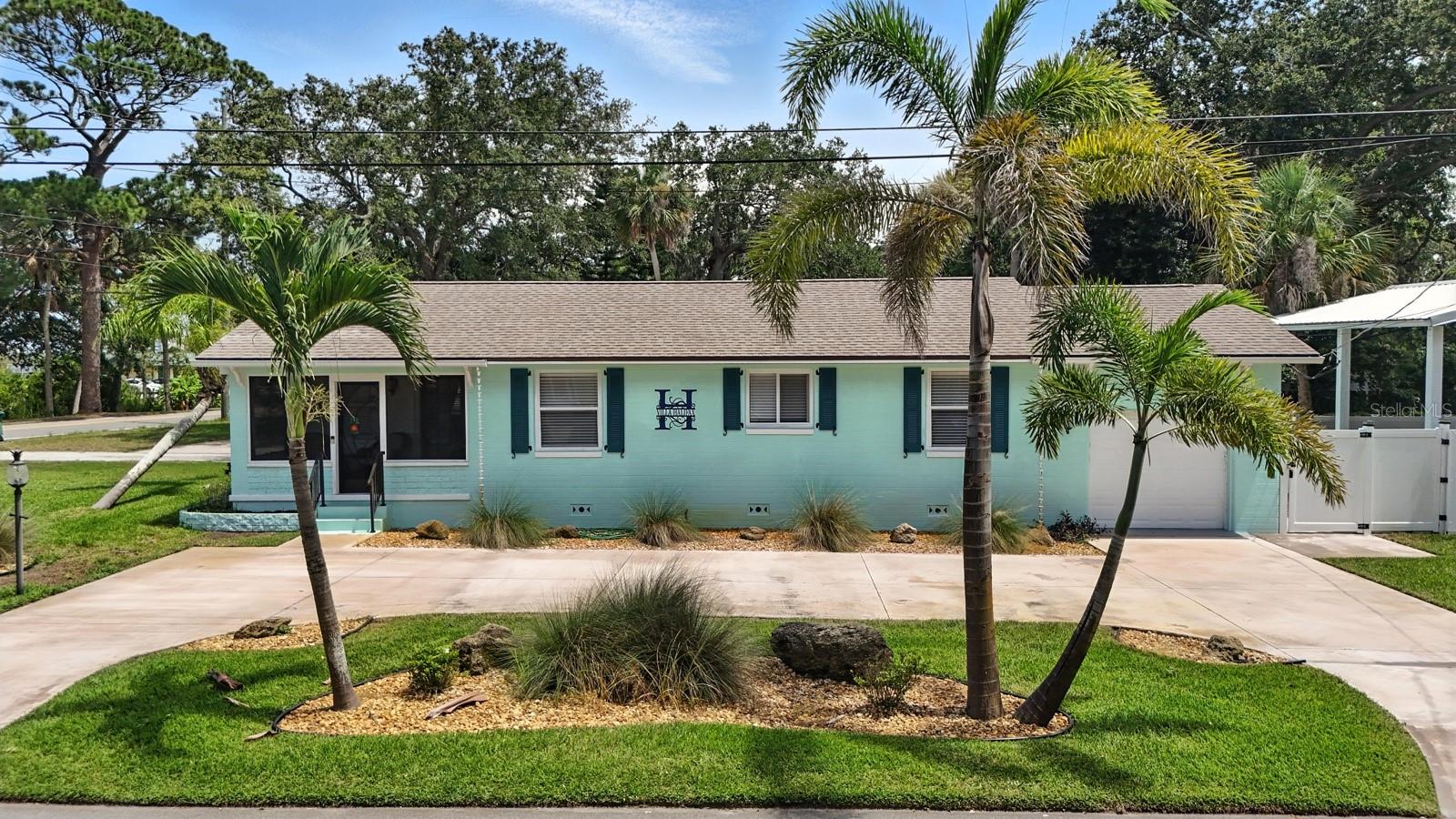 Welcome to 1146 Riverside Drive, a fully renovated waterfront oasis nestled along one of Daytona Beach’s most scenic stretches. This exceptional property offers direct water access with riparian rights, allowing you to build your own private dock—perfect for boating, paddleboarding, or peaceful evenings spent fishing. Whether you're searching for a luxury vacation retreat, a high-performing investment, or a serene place to call home, this one checks every box.
No detail was overlooked in the home’s transformation. The property features all-new electrical and a modernized panel, along with brand-new plumbing—including water and drain lines that extend all the way to the street. A new HVAC system, inside and out, ensures year-round comfort. The kitchen is enhanced with under-cabinet lighting, and updated fixtures can be found throughout. Fresh interior and exterior paint, a re-screened porch, updated lighting, and garage keypads add to the turnkey appeal.
Outdoors, the upgrades are just as impressive. The backyard has been raised with loads of fill dirt for better elevation and usability, then finished with professional landscaping and vinyl fencing for both beauty and privacy. A custom tan-tinted concrete circular driveway, sidewalks, and pole barn slab add striking curb appeal and durability. The real showstopper is the oversized pole barn, complete with beautiful nighttime lighting, making it the perfect space for entertaining, relaxing, or hosting unforgettable outdoor gatherings.
An outdoor shower adds a coastal touch that’s ideal after a day on the boat or at the beach. And speaking of the waterfront, the lot has been thoughtfully cleared near the river to open up your view and includes a tranquil picnic area nestled under the trees—your own private riverfront retreat.
Located just minutes from the beach and only a short drive to Granada Boulevard’s top-rated restaurants and the Ormond Scenic Loop, this home combines the best of Florida lifestyle with smart, lasting upgrades. With every major system already redone, a gorgeous backyard perfect for hosting, and endless potential for waterfront living, 1146 Riverside Drive is a rare and ready-to-enjoy gem.