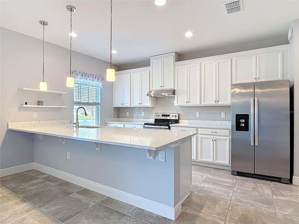 Photo of 5644 Estero Loop, Port Orange, FL 32128 (MLS # O6420644)