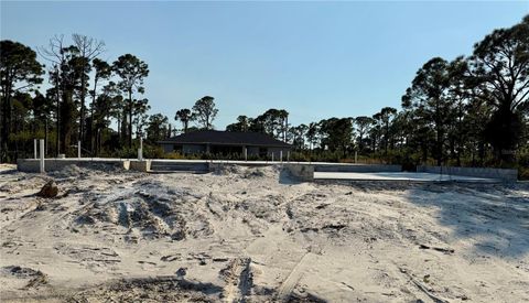 Photo of 14185 Banos Avenue, Port Charlotte, FL 33981 (MLS # C7517103)