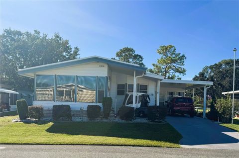 Photo of 178 Hibiscus Way, Leesburg, FL 34748 (MLS # R4910191)