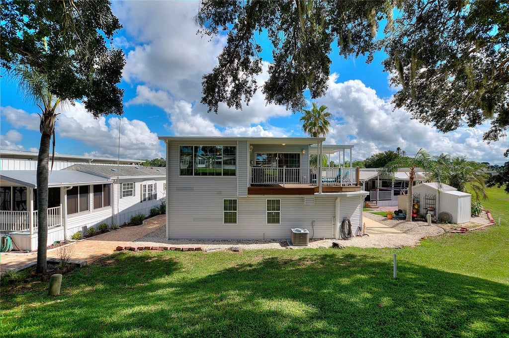 Photo of 613 Par Pines Boulevard, Davenport, FL 33837 (MLS # O6443579)