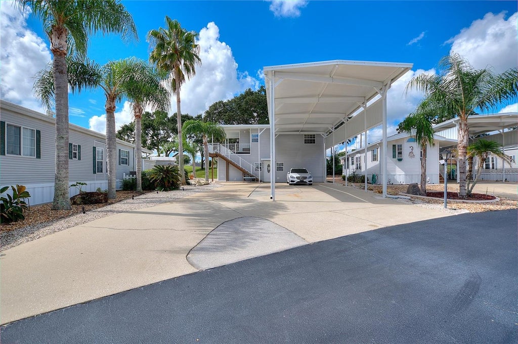 Photo of 613 Par Pines Boulevard, Davenport, FL 33837 (MLS # O6443579)