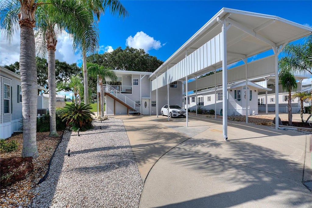 Photo of 613 Par Pines Boulevard, Davenport, FL 33837 (MLS # O6443579)