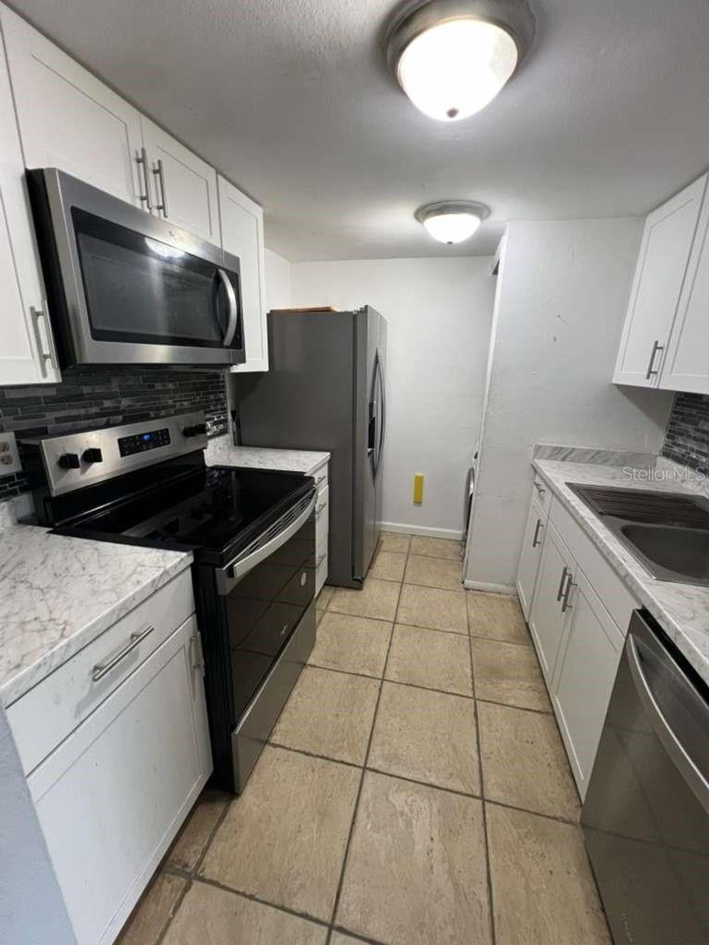 Photo of 851 Sky Lake Circle #D, Orlando, FL 32809 (MLS # O6351498)