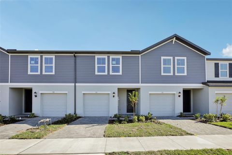 Photo of 713 Spartina Way, Lady Lake, FL 32159 (MLS # O6360989)