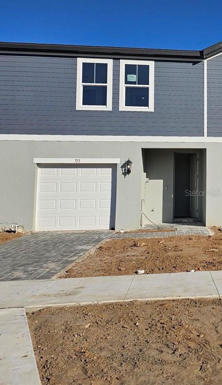One or more photo(s) has been virtually staged. Under Construction. New Construction Townhome in Reserve at Hammock Oaks – Lady Lake, FL
3 Beds | 2.5 Baths | 1-Car Garage | 1,485 Sq Ft | Energy Star Certified | Move-In Ready
Be one of the first to own a brand-new, low-maintenance townhome in the Reserve at Hammock Oaks—just minutes from The Villages in Lady Lake, Florida. This two-story home offers modern design, energy efficiency, and a prime location near shopping, dining, parks, and medical centers.
Interior Features
•  1,485 sq ft of thoughtfully designed living space
•  3 spacious bedrooms and 2.5 bathrooms
•  White cabinets with elegant crown molding
•  Quartz countertops in kitchen and bathrooms
•  Stainless steel kitchen appliances: refrigerator, range, microwave, and dishwasher
•  Washer, dryer, and blinds included—truly MOVE-IN READY
•  Large-format tile in all living areas; cozy carpet in bedrooms
•  Kitchen island with counter-height bar seating, open to the Great Room
•  Kitchen sink view overlooking backyard and living space—ideal for entertaining
Energy Efficiency & Comfort
•  Energy Star Certified construction
•  Spray foam insulation and fresh air intake system
•  Designed to reduce allergens, improve indoor air quality, and lower utility bills
•  A healthier, quieter, and more energy-efficient home
Community Amenities
•  Resort-style pool and splash pad
•  Playground and dog park
•  Pickleball courts and walking trails
•  Beautiful green spaces for outdoor enjoyment
Prime Location
•  Minutes from The Villages—Florida’s premier retirement destination
•  Close to shopping centers, restaurants, parks, and medical facilities
•  Easy access to outdoor activities, golf courses, and entertainment
•  Ideal for weekend getaways, seasonal living, or full-time Florida lifestyle
Perfect For
•  First-time homebuyers ready to stop renting and start owning
•  Snowbirds seeking a lock-and-leave Florida retreat
•  Investors looking for strong rental income potential in a growing area
Ready Before Year-End
Don’t miss your chance to own one of the first townhomes in this exciting new community. Schedule your tour today and make this home yours before the end of the year!