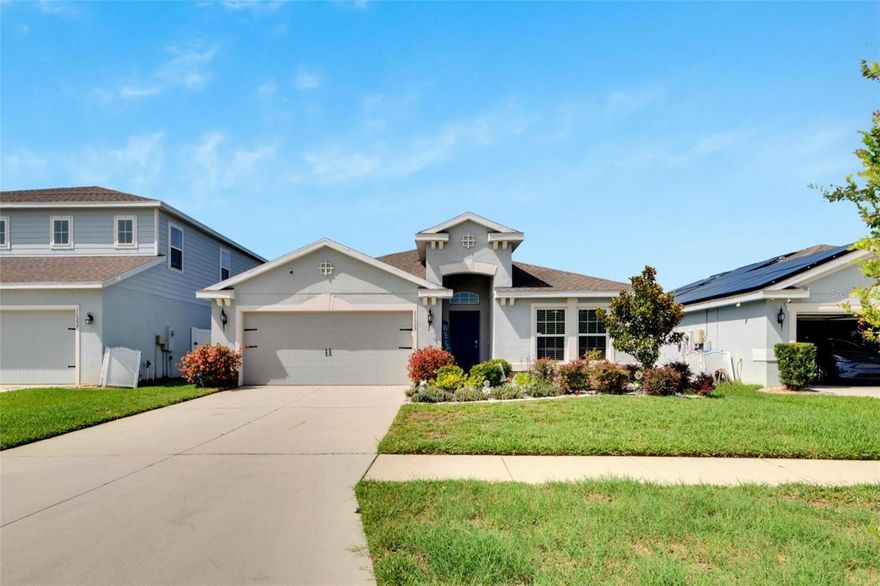 Welcome to Carlton Lakes — Riverview, FL 33579's most sought-after waterfront community, consistently ranked among Florida's best places to live. This stunning 4-bedroom, open-concept solar home, built in 2018, delivers the energy-efficient, resort-lifestyle that today's buyers are actively searching for — at a remarkably low $10/month HOA. Fully paid-off solar panels keep monthly electric bills between just $40–$50, a true game-changer in today's market. 42-inch white wood kitchen cabinets with granite countertops round out the recent upgrades that make this home move-in ready and future-proof. Inside, a thoughtfully designed 3-way split floor plan flows across soaring vaulted ceilings and elegant 17-inch diagonal ceramic tile, bathed in natural light. The primary suite is a private retreat, while three additional bedrooms flex perfectly for families, remote workers, or multi-generational living. Step out back to your fenced waterfront sanctuary with serene pond views, swaying palms, a tranquil setting to relax in. Community amenities include a resort-style pool, clubhouse, playground, and dog park, all just steps away. Minutes from I-75, top-rated Hillsborough County schools, and the best of Greater Tampa Bay dining and retail. This is the waterfront, energy-efficient dream home in Riverview, FL you've been waiting for, schedule your private showing before it's gone.