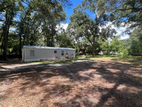 Photo of 23924 NW 182nd Place, High Springs, FL 32643 (MLS # GC543297)