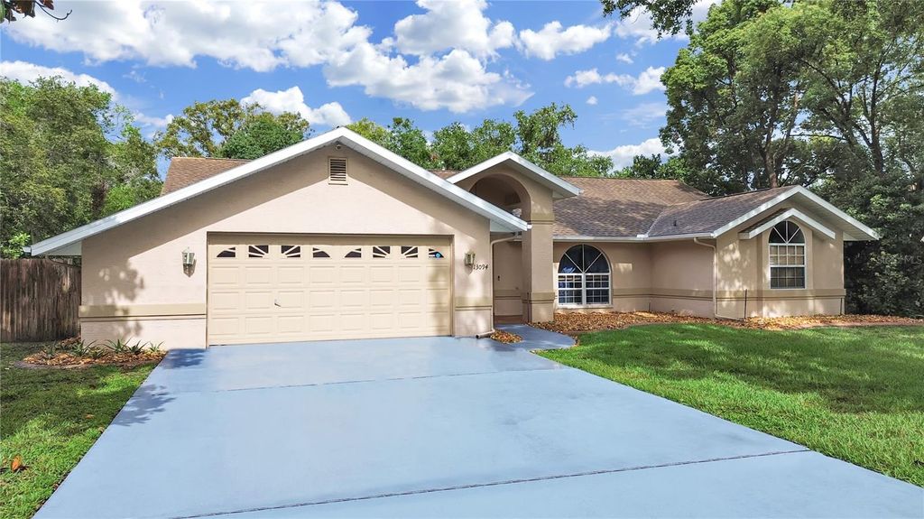 Photo of 13094 Huntington Woods Avenue, Spring Hill, FL 34609 (MLS # TB8393021)