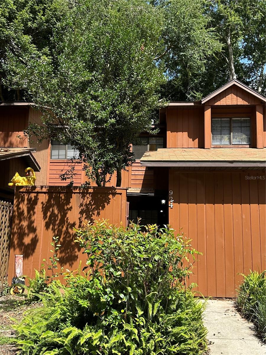 Located in Rockwood Villas near Butler Plaza and Oaks mall. On the bus route for University of Florida & Santa Fe college. This unit is a 2-bedroom, 2 bath with a bonus room upstairs. Primary bedroom is downstairs, Living room & dining room combo. Kitchen downstairs, laundry room on back porch. Complex has 2 pools, tennis court, pest control is included, trash included & outside maintenance.