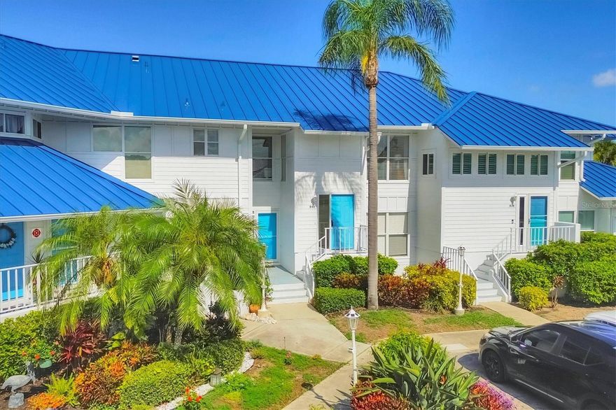 Million-Dollar Sunset Views – Without the Price Tag! Step into your dream Florida lifestyle with this sun-drenched 2-bedroom, 2-bath condo, perfectly situated on the second floor for panoramic sunset views of Anna Maria Sound and the Intracoastal waterway beyond and an elegant Parisian flair. Featuring vaulted ceilings, luxury vinyl plank flooring, and Italian ceramic tile, this light-filled residence offers both style and comfort. Enjoy the peace of mind of a brand-new roof, a screened-in lanai with extra storage, and a layout that suits year-round living, seasonal getaways, or income-generating rentals (rented for Jan-March of 2026). Located in Shoreline Terraces I, a quiet enclave within the sought-after Perico Bay Club, you'll appreciate: a private community pool and spa with restrooms, a well-managed association that includes exterior building and common area maintenance. Beyond your doorstep Perico Bay Club offers: a fitness center, lending library,  multiple social and gathering spaces, tennis and pickleball courts, shuffleboard courts, a kayak launch and storage area and a second heated junior-Olympic size lap pool. Perico Bay Club is a vibrant community with many opportunities for social engagement. Explore nature on the community boardwalks, or bike and hike through nearby Robinson and Neal Preserves, plus the spectacular sugar-sand beaches of Anna Maria Island are just 2.2 miles away! Whether you're looking for a primary home, winter escape, or investment, this condo is your ticket to coastal living at its finest — without breaking the bank!