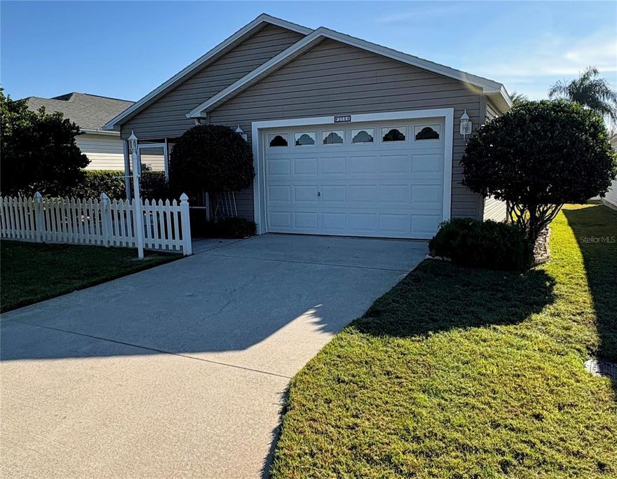 MOVE-IN READY!!!  2008 Cabot Cove Model 2 BR / 2 BA 1.5 Car Garage, New Roof October 2025, HVAC System Replaced 2022, Hot Water Tank 2023, SMALL Bond Balance $5,305.  Beautiful Mature Landscaped Property and easy to maintain.
Location is KEY its in The Village of Hemingway, Margaux Villas featuring golf cart paths to everywhere you want to explore and discover.   Havana Country Club, Walmart Neighborhood Store and Gas Station and Colony stores, shops and restaurants, this property is centrally located between the 466 & 466A and between Morse BLVD and Buena Vista BLVD.  Closest Entertaining and Dining Fun is Lake Sumter Landing Square that has all the nightlife for all.  This home has been freshly painted interior, light and bright and has easy to care for LPV (Luxury Plank Vinyl) throughout.  Window shades in front are operated with RC (Remote Control) Back bedrooms both have plantation shutters.  Margaux Villa Neighborhood features quite tucked away living, lush landscaping throughout, freshly paved streets and this property is located one house in from end of street so very secluded and extra parking for friends to come over and enjoy it.  WOW don't wait long, great LOCATION, LOCATION, LOCATION and IMMEDIATE MOVE IN READY FOR YOU!!!!!