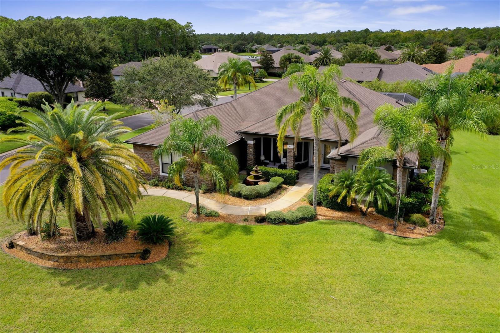 Luxurious 4-Bedroom Pool Home in Prestigious Plantation Bay's Westlake Enclave. Welcome to your dream home! This stunning 4-bedroom, 2.5-bath Preakness II model residence offers resort-style living with a private pool, and thoughtful design. From the moment you arrive, the dramatic courtyard-style entrance and lush, professionally landscaped corner lot make a memorable impression. The 3-car side-entry garage, stately palms, and exterior stone accents add both style and function.
Inside, this home truly shines with elegant upgrades including crown molding and stunning new wood flooring (2020) in 3 bedrooms. The spacious, open floor plan is highlighted by soaring 12-foot ceilings (10-foot in bedrooms), custom art niches, and abundant recessed lighting. The gourmet kitchen is a chef's dream—featuring granite countertops, upgraded 42'' cabinetry, a center island with deep double sinks, and plenty of prep space. New Bosch dishwasher (2020), Refrigerator (2021), and a new Microwave oven (2024). Perfect for entertaining, the adjoining family room boasts a cozy gas fireplace, ceramic tile flooring, oversized windows with plantation shutters, and built-in surround sound system which was upgraded with a whole house amplifier (2020).
Retreat to the luxurious primary suite, complete with a tray ceiling, crown molding, new custom doors (2023), and an expansive ensuite bath that includes a doorless walk-in shower, a jetted jacuzzi tub, and ample space to relax and unwind. Step outside to your private lanai and custom summer kitchen, ideal for hosting gatherings or enjoying quiet evenings by the pool. A convenient pool bath adds extra comfort for guests. Plus, enjoy the added peace of mind and quality of the Pelican Whole House Water Filtration System. Recent upgrades include a water heater (2024), New roof (2016), Solar panels to heat pool, Modern ceiling fans, New Mitsubishi mini-split AC added in 3 bedrooms, new washer & dryer (2023), and so much more! (See complete list of upgrades.) Home exterior was repainted in 2024. This home is in excellent condition, meticulously maintained, with an abundance of upgrades. Don't let this one get away! This exceptional home offers the perfect balance of open-concept living and private retreat spaces designed for both comfort and style.
Plantation Bay offers a country club lifestyle with membership optional amenities - 45 holes of golf, Tennis, Bocce Ball, Pickleball, a wellness center with two pools and poolside cabana, a children's playground, walking trails, and two clubhouses, including the new, impressive Founders Club. You're only minutes away from beaches, eateries, Daytona International Airport, NASCAR racing, hospitals, shopping, and universities. You've found the perfect home, centrally located, with all the amenities to enjoy the Florida Lifestyle! Make it yours today!