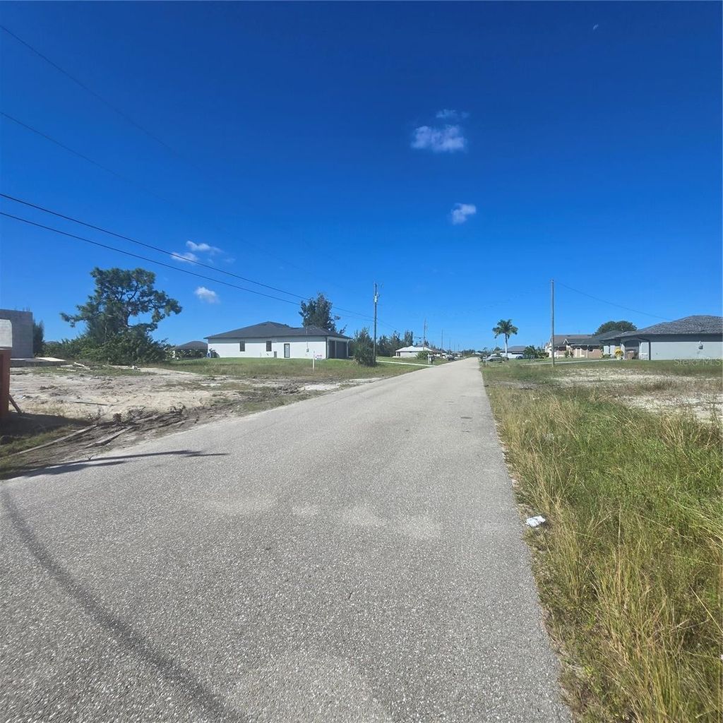 Photo of 2031 NW 21st Street, Cape Coral, FL 33993 (MLS # O6364999)