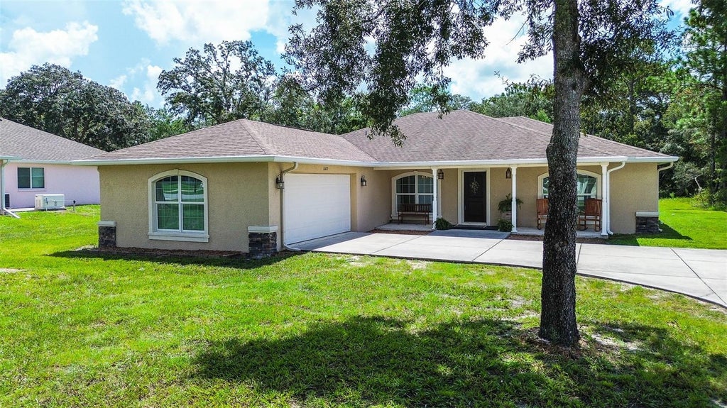 Photo of 11472 Pine Warbler Avenue, Brooksville, FL 34614 (MLS # TB8537913)