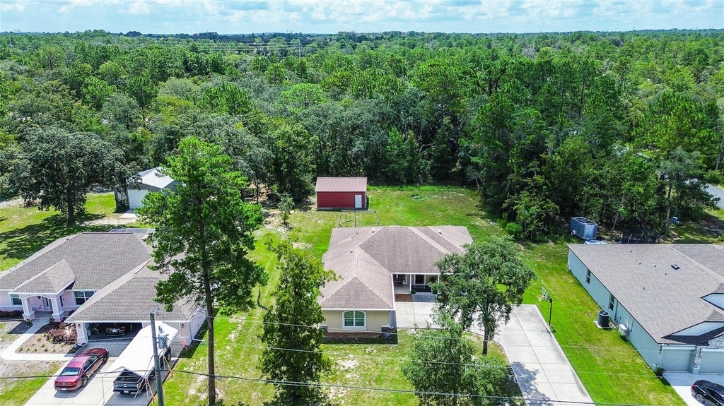 Photo of 11472 Pine Warbler Avenue, Brooksville, FL 34614 (MLS # TB8537913)