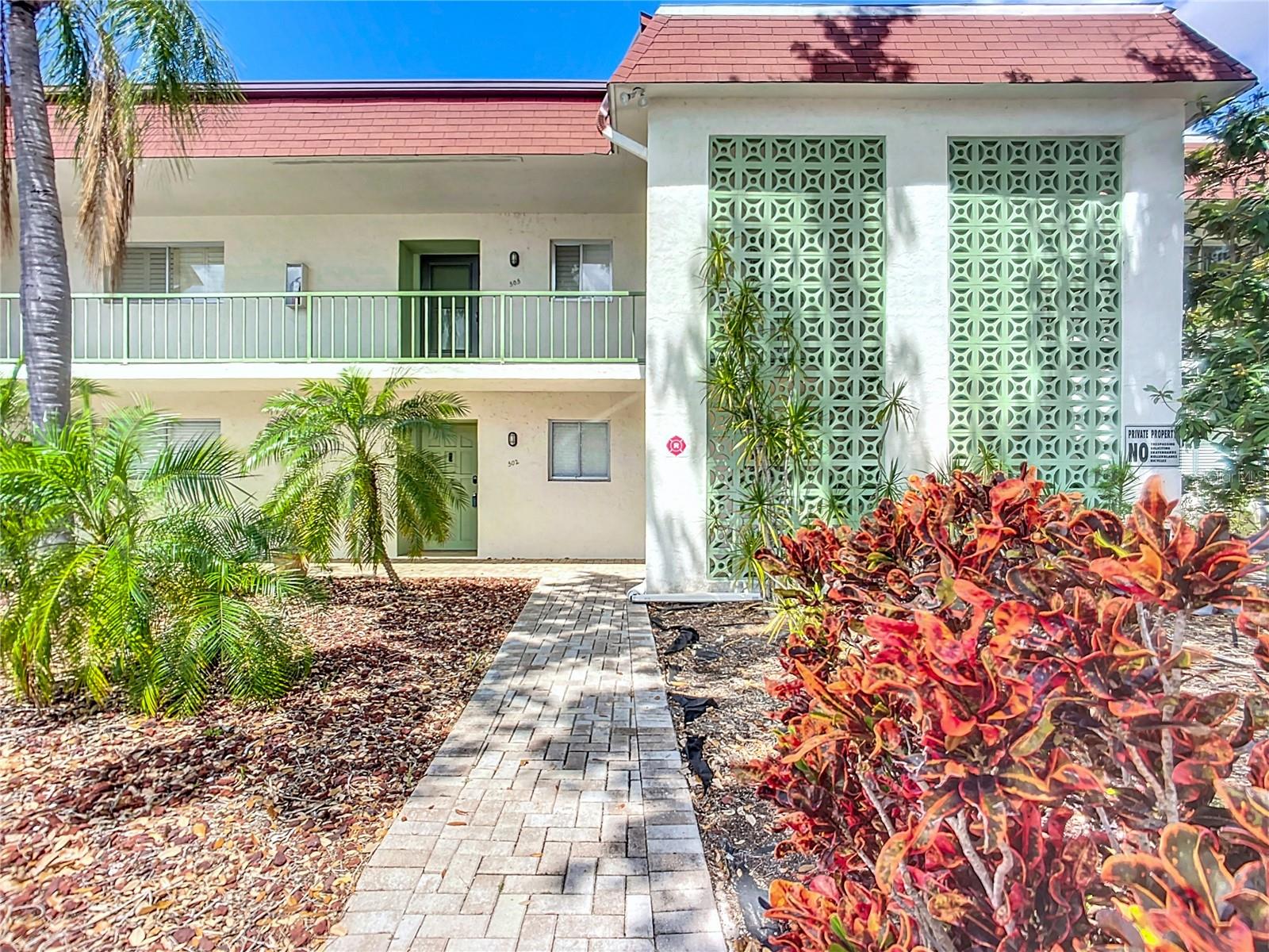 BEST-PRICED UNIT IN DESIRABLE BENEVA VILLAGE! This top/second-floor home has two bedrooms and two bathrooms, an open floor plan, and a large screened lanai: nicely updated flooring and finishes, good closet/storage space, and lots of natural light. Beneva Village is a well-run association with an inground pool, two on-site laundry rooms, assigned parking, and plenty of guest parking. It is in a great location, just minutes from all Sarasota's most desired features, including downtown, Siesta Key, shopping, dining, and entertainment. The unit is currently leased to long-term tenants who have a lease in place for $1650 a month until 04/30/26. Current market rents are $1800+, making this a great income property, vacation home, or primary residence. The condo fee includes water/sewer, trash, common area maintenance, etc.