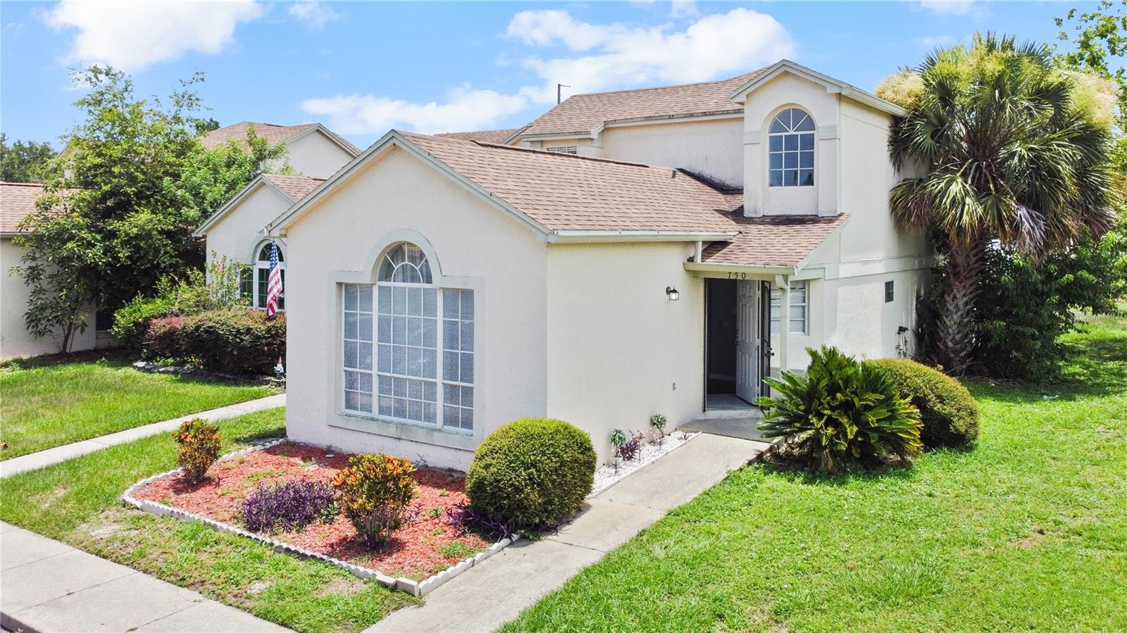 Don’t miss this move-in ready, end-unit 3-bedroom, 2-bath townhome. You will not have to leave your community to have fun; this complex offers a private boat ramp to Lake Olympia, with the community pool overlooking the lake, tennis courts, and a dog park!! The HOA also covers the roof (new in 2020) and exterior maintenance. The home has just been beautifully updated with a brand-new kitchen featuring upgraded cabinets, stylish backsplash, granite countertops, high-end NEW stainless steel appliances, and tile flooring. The primary suite, conveniently located on the first floor, boasts a fully renovated bathroom with modern tile shower, gorgeous vanity, granite counters, updated lighting, mirrors, and floor tile. Additional upgrades include NEW AC unit, NEW kitchen appliances, new carpet in the bedrooms and staircase, and updated ceiling fans and light fixtures throughout. Enjoy a spacious family room with crown molding and easy-care laminate floors. Upstairs, you’ll find two additional bedrooms and a full bath. Outdoor living is just as impressive with a covered, screen-enclosed patio and a fully fenced courtyard—perfect for relaxing or entertaining. The community offers incredible waterfront amenities, including a private boat ramp, LAKEFRONT pool and beach area, tennis courts, and a dog park. Located with convenient access to the Florida Turnpike, SR 429, and SR 408, you're less than 15 minutes from Downtown Winter Garden and the West Orange Trail, and under 30 minutes to Disney and Universal.