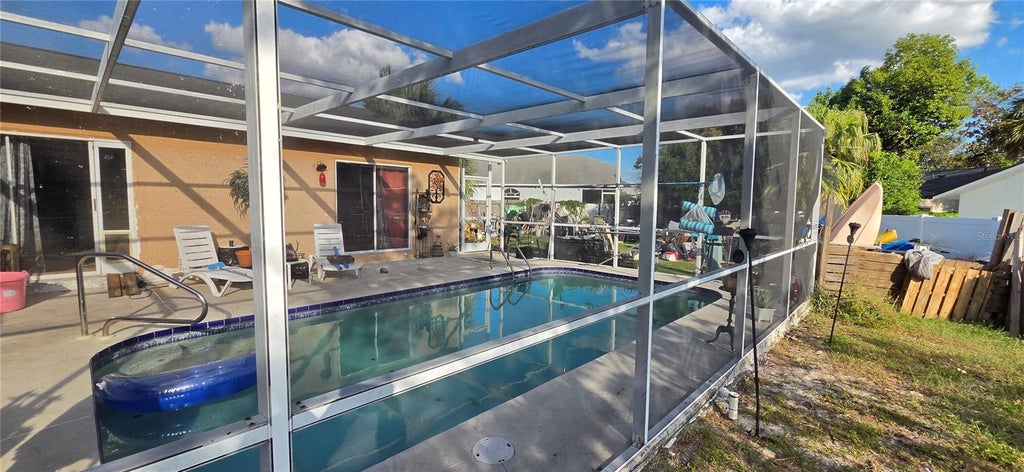 Photo of 10230 Autumnwood Drive, Hudson, FL 34667 (MLS # W7890617)