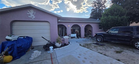 Photo of 10230 Autumnwood Drive, Hudson, FL 34667 (MLS # W7890617)