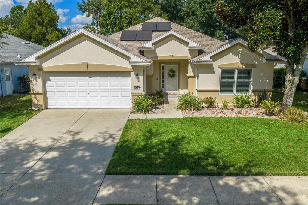 Photo of 5509 SW 42nd Place, Ocala, FL 34474 (MLS # OM734218)