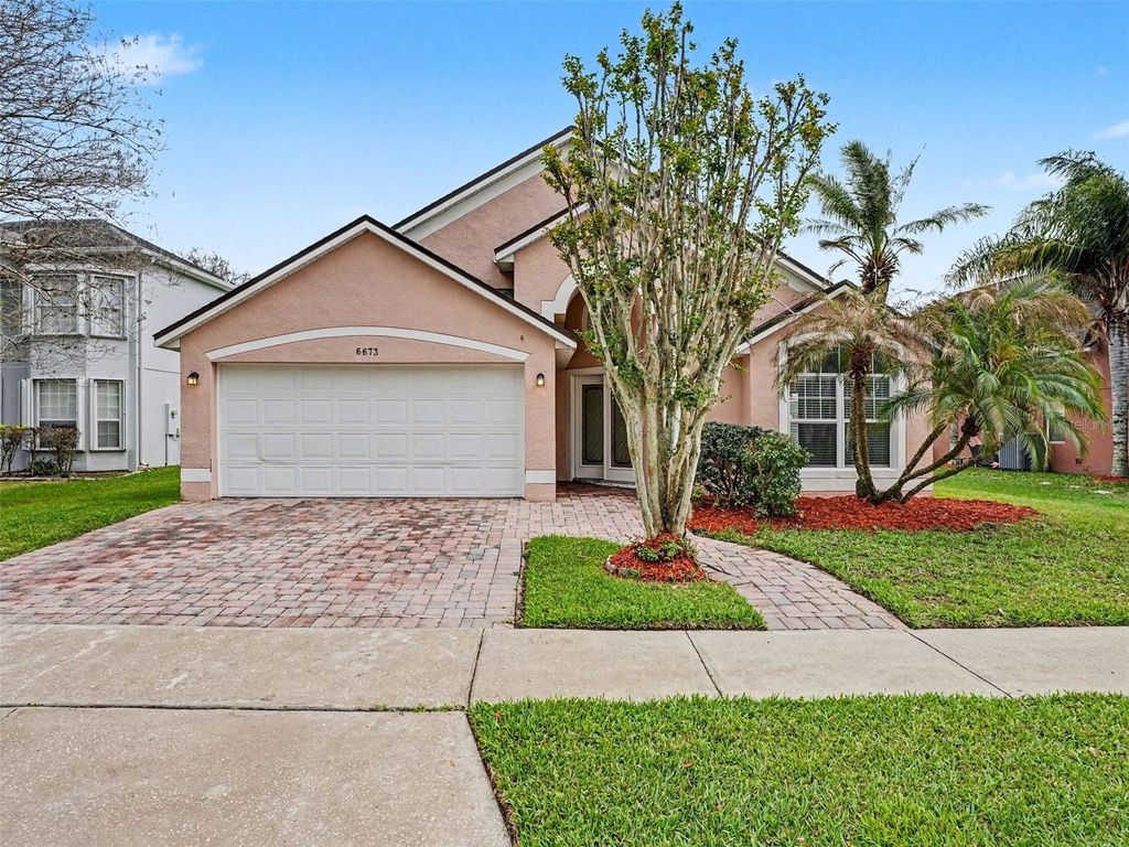 Photo of 6673 Bouganvillea Crescent Drive, Orlando, FL 32809 (MLS # O6388313)
