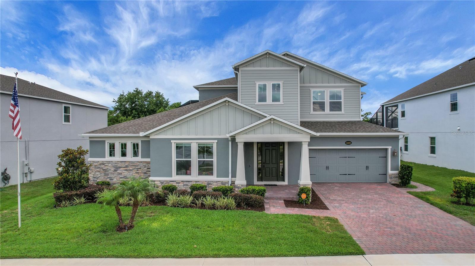 Price reduced! Motivated seller! Welcome to this beautifully appointed 5-bedroom, 4.5-bath home offering over 4,030 sq ft of luxurious living space, located inside the exclusive gated community of Tilden Place. The moment you walk through the front door, you’re greeted by a perfect view of the breathtaking grotto waterfall (only 1 year old) that hides your secluded spa — creating a true oasis right in your own backyard.
Inside, enjoy a spacious layout featuring gorgeous granite countertops including a huge island with a waterfall countertop and a stylish glass backsplash in the kitchen — perfect for cooking and entertaining. The garage comes equipped with an electric vehicle charger, ready for your EV. The master suite is conveniently located on the main floor, along with a second bedroom featuring its own private en suite — ideal for guests.
Upstairs, you’ll find a large bonus room perfect for an arcade, pool table, or media space, plus three additional bedrooms, all with walk-in closets. One of the upstairs bedrooms features its own private en suite, while the other two bedrooms share a full bathroom.
Step outside to your private backyard paradise: a resort-style pool with waterslide, lazy river, a full outdoor kitchen, and a pool half bathroom for convenience, all enclosed by a panoramic lanai, keeping things bug-free. Best of all, there are no rear neighbors — the home backs onto peaceful conservation land, offering extra privacy and stunning nature views.
Located just minutes from Winter Garden shops, with easy access to SR 429 and close to Disney attractions, this home offers the ultimate blend of luxury, space, and location. Whether you’re hosting guests, relaxing by the spa, or enjoying the vibrant local scene, this property has it all.
Don’t miss your chance to own this incredible home — schedule your showing today!