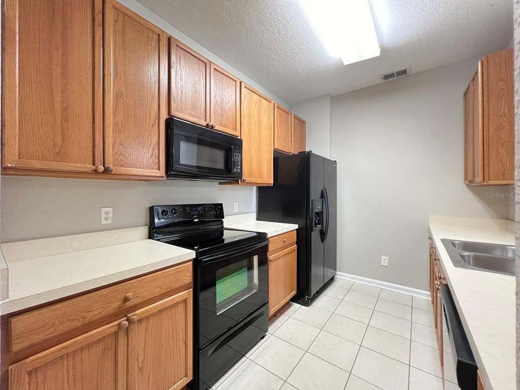 Photo of 2484 San Tecla Street #204, Orlando, FL 32835 (MLS # O6420760)