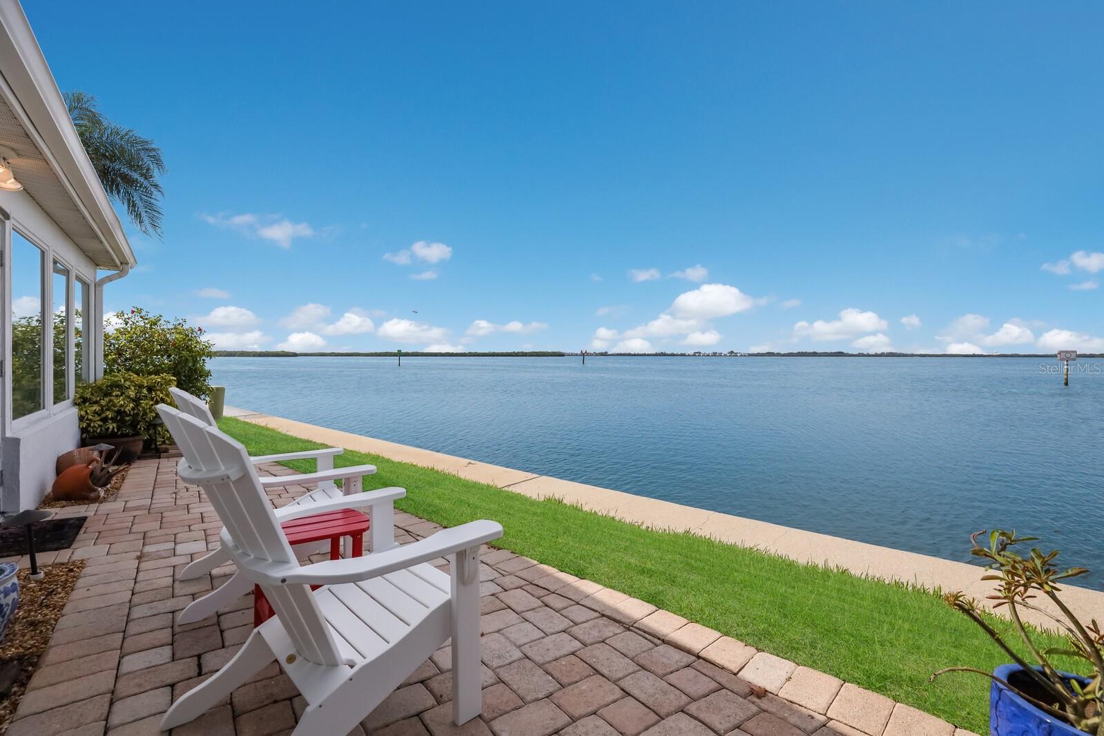 FULL WATER FRONT NEWLY RENOVATED (internal photos coming soon) and TURNKEY FURNISHED VILLA for SEASONAL LEASE -3 MONTH MINUMUM RENTAL. AVAILABLE STARTING DECEMBER 1, 2025. Seasonal Lease January-April is $7,000 per month (OR inquire about annual or off season option at $5,500/month). Utilities, Cable and Tax included! Waterfront Villa with Full Bay Views in Spanish Main Yacht Club – Experience the best of island living in this open and airy freestanding villa. This spacious 2-bedroom, 2-bath home is thoughtfully updated and filled with natural light, offering a serene escape on Longboat Key. Wake up to breathtaking full Bay views and unwind in the evenings with a cocktail while watching boats drift by—direct access to the Intracoastal Waterway is just steps from your door. This rare waterfront opportunity includes beach access just across Gulf of Mexico Drive and use of the private 40-slip marina (first-come, first-serve), perfect for boaters with vessels up to 40 feet. Nestled within a beautifully maintained community, Spanish Main offers an active coastal lifestyle surrounded by natural beauty, peace, and privacy AND available to all (no longer a 55+ community). Located just minutes from St. Armand's Circle and downtown Sarasota, you’re close to fine dining, boutique shopping, and award-winning beaches. Per community rules, no pets are permitted. Contact us today for availability and rental terms.