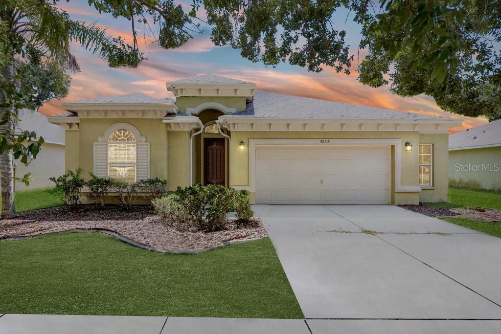 One or more photo(s) has been virtually staged. Welcome to Your Spacious Florida Retreat in Brookfield Estates! This beautifully maintained 4-bedroom, 3-bath home offers a perfect blend of comfort and functionality. Step inside to discover a light-filled interior with soaring ceilings, tile flooring in main living areas, and neutral paint throughout. The formal living and dining rooms greet you with elegance and flow effortlessly into the expansive kitchen—featuring GRANITE COUNTERTOPS, STAINLESS STEEL APPLIANCES, rich WOOD CABINETRY, and a LARGE BREAKFAST BAR, perfect for gatherings. The kitchen overlooks the inviting living room, ideal for entertaining or relaxing nights in. A split-bedroom floor plan provides privacy, with the oversized primary suite offering a TRAY CEILING, DUAL VANITIES, a SOAKING TUB, SEPARATE SHOWER, and a LARGE WALK-IN CLOSET. The massive yet versatile family room can serve as a 5TH BEDROOM, ENTERTAINMENT SPACE, or an ENORMOUS MAN CAVE, providing endless options for customization. The property also features an OVERSIZED GARAGE, perfect for all your toys and additional storage. Three additional bedrooms have plenty of flexibility for guests, a home office, or playroom. Enjoy indoor-outdoor living with glass doors leading to the backyard—ready for your personal touch! The INSIDE LAUNDRY ROOM includes built-in shelving. Located on a quiet street with mature landscaping, this home is just minutes from shopping, dining, parks, and top-rated schools. Don't miss this opportunity to own a move-in ready home in a desirable WESLEY CHAPEL community—schedule your private tour today! SELLER TO PROVIDE A BRAND NEW ROOF PRIOR TO CLOSING AND A CREDIT TOWARDS NEW CARPETING. 13-month PREMIUM HOME WARRANTY will be provided by the Listing Agent from Choice Home Warranty valued at $660.