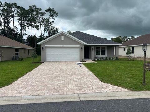 Photo of 7637 SW 180th Circle, Dunnellon, FL 34432 (MLS # OM702744)