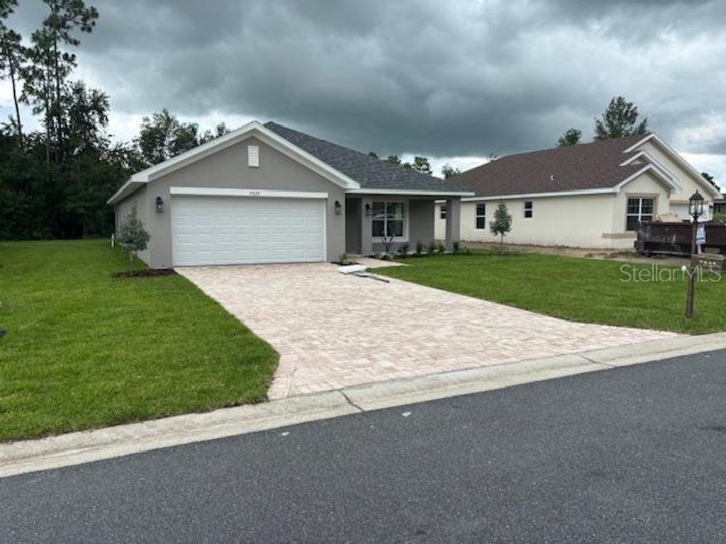 Photo of 7637 SW 180th Circle, Dunnellon, FL 34432 (MLS # OM702744)
