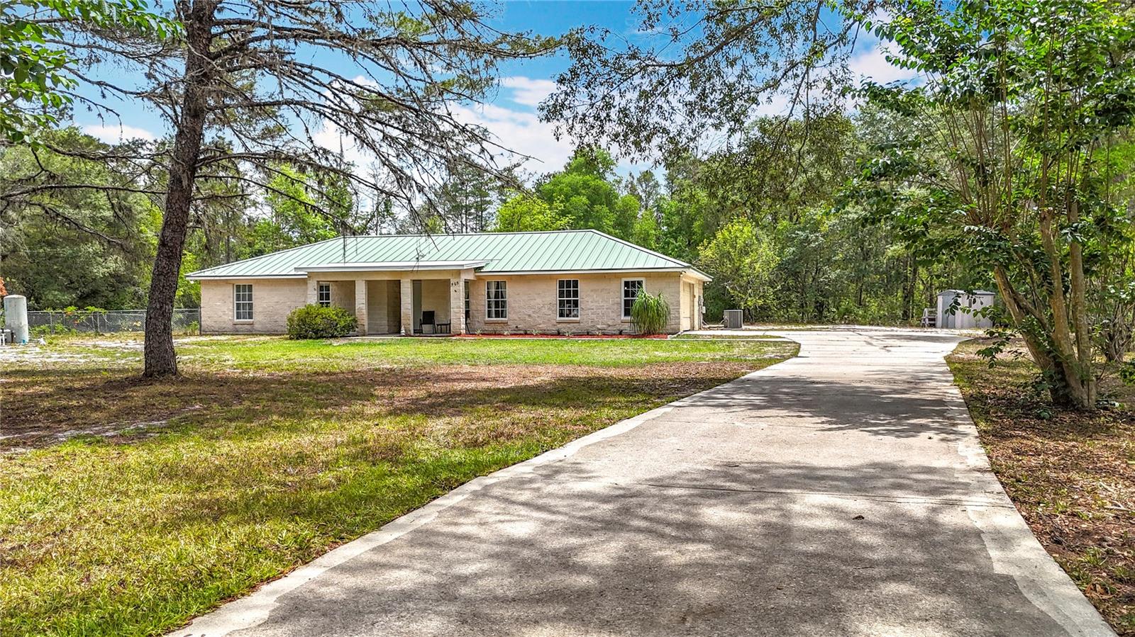 Tucked away on nearly 15 acres along the Ocklawaha River, this upgraded 3-bedroom, 2-bath home offers the rare balance of privacy, outdoor living, and modern updates. Whether you're after a huntable property, weekend retreat, or full-time residence surrounded by nature, this one checks every box.
Inside, you'll find 1,542 square feet of living space with an open layout, fresh interior paint, and a seamless flow between the living, dining, and kitchen areas. Recent updates include a one-year-old metal roof, new central HVAC, and radiant barrier insulation to keep energy costs in check.
The primary suite features a beautifully renovated bath with a cultured marble shower and modern vanity. Two additional bedrooms and a second updated bathroom provide space for guests, work, or hobbies.
Outdoors, a private drive leads to a two-car garage, oversized parking, and plenty of room for boats, RVs, or ATVs. With huntable acreage, and no nearby neighbors in sight, this Ocklawaha property delivers the space—and freedom—to live the Florida lifestyle on your terms.
Just a short drive from Ocala and The Villages.
